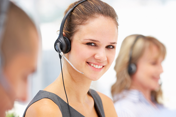 Young businesswoman wearing headset