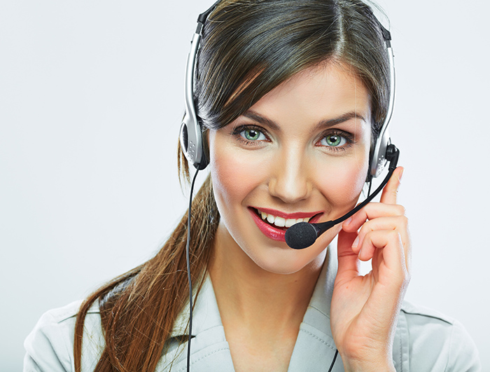 Customer support operator close up portrait.  smiley call center
